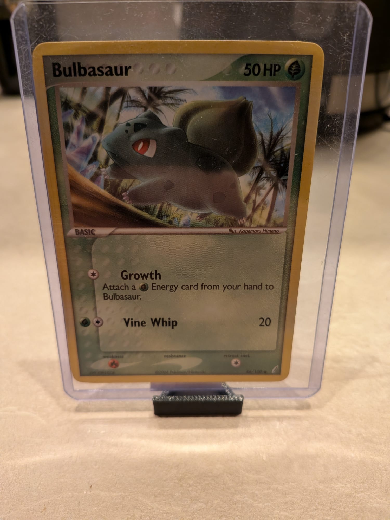 Bulbasaur 46/100 Pokémon kaart uit EX Crystal Guardians set 2006 - Grass type Basic kaart geïllustreerd door Kagemaru Himeno